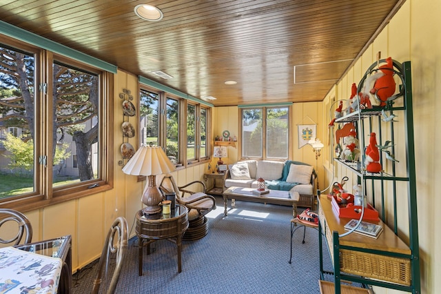 sunroom featuring wooden ceiling