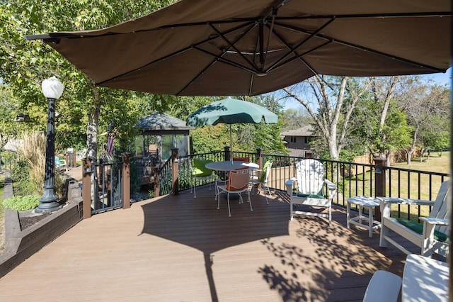 wooden deck with a gazebo