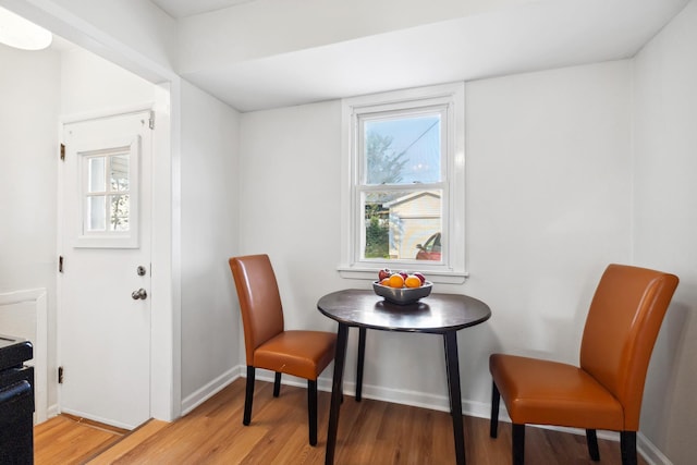 dining area with light wood-type flooring