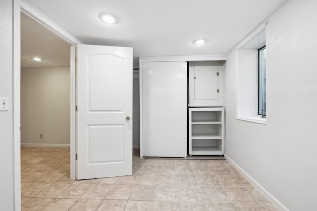 unfurnished bedroom featuring a closet