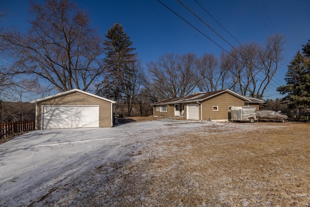 view of side of home featuring a garage