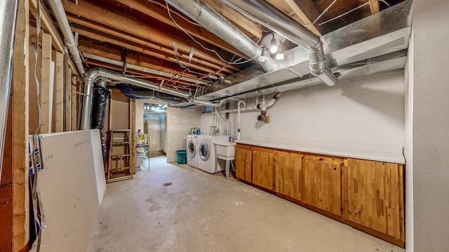 basement featuring washer and dryer