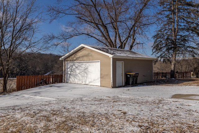 view of snow covered garage