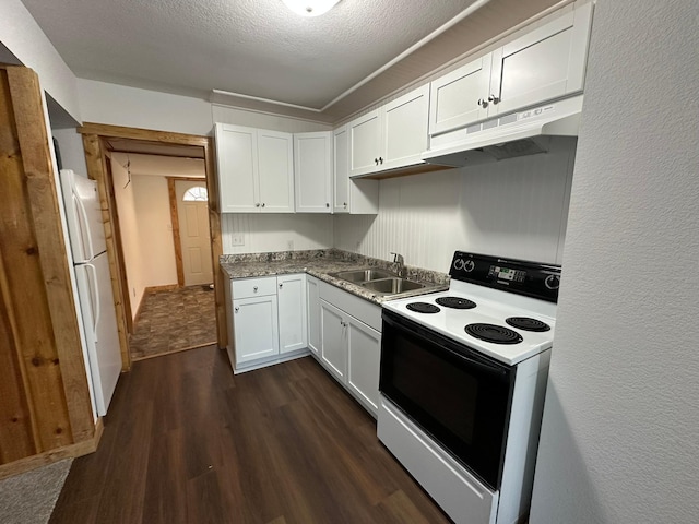 kitchen featuring white fridge, electric stove, sink, dark wood-type flooring, and white cabinets