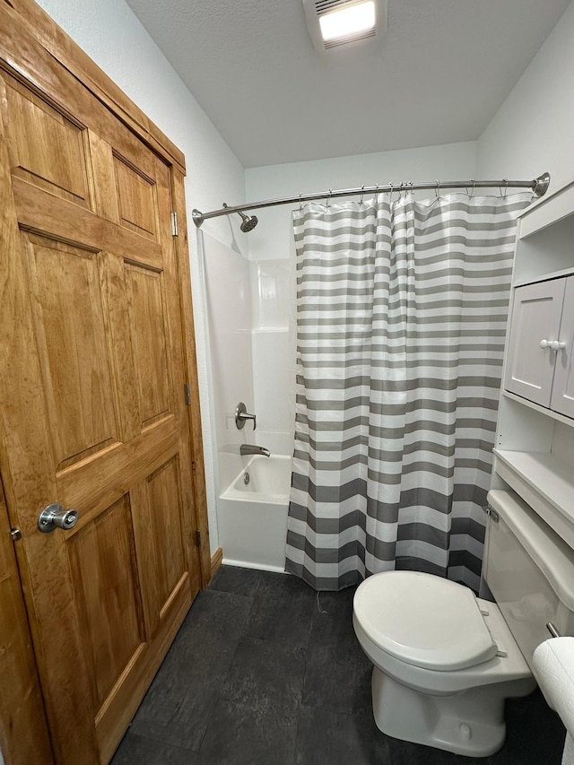 bathroom featuring toilet and shower / bathtub combination with curtain