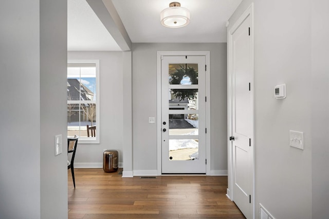 entrance foyer with dark hardwood / wood-style flooring