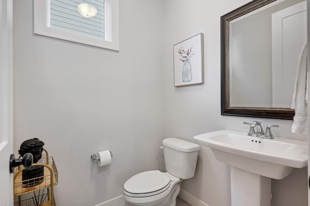 bathroom with sink and toilet