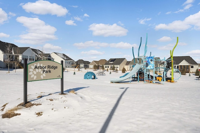 view of snow covered playground