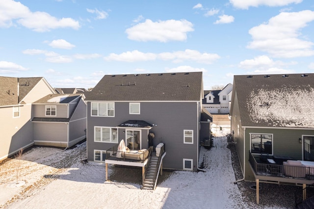 back of property with outdoor lounge area