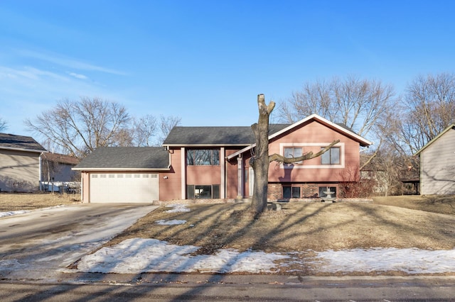 view of front of property featuring a garage