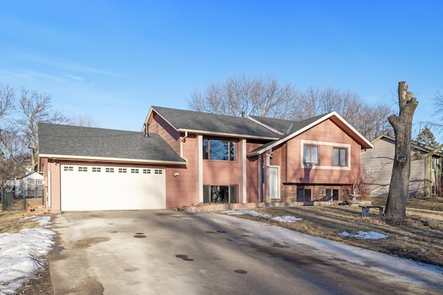 bi-level home with a garage