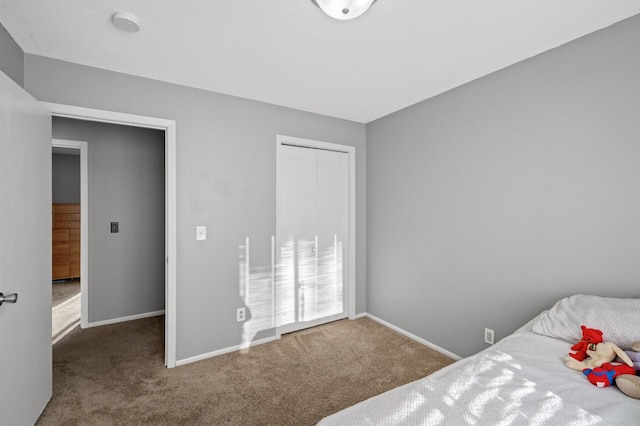 unfurnished bedroom with a closet and carpet