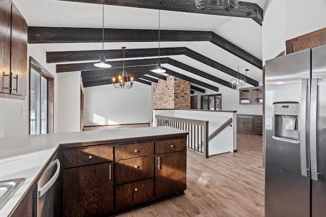 kitchen with appliances with stainless steel finishes, lofted ceiling with beams, a notable chandelier, dark brown cabinetry, and light wood-type flooring