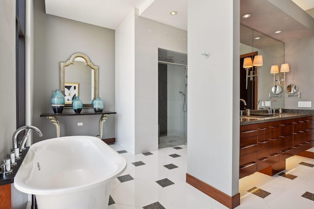201 11th St Unit 2600, Minneapolis, MN 55403 - bathroom featuring a stall shower, a freestanding tub, vanity, and recessed lighting