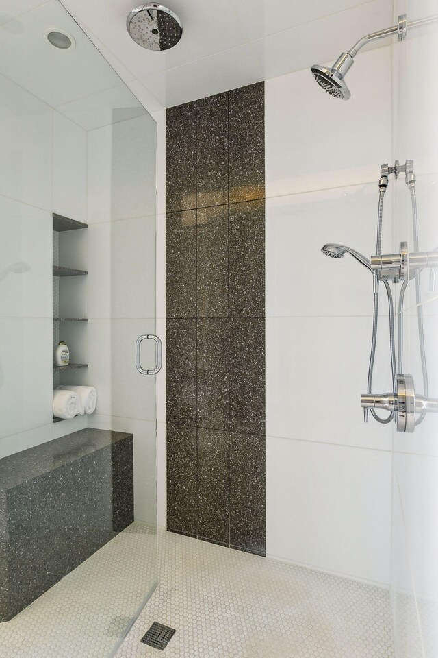 201 11th St Unit 2600, Minneapolis, MN 55403 - full bath featuring a shower stall and tile patterned flooring