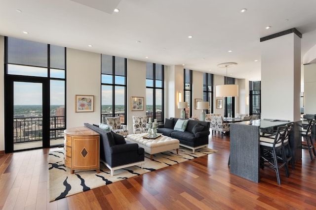 201 11th St Unit 2600, Minneapolis, MN 55403 - living room featuring wood finished floors, expansive windows, plenty of natural light, and recessed lighting