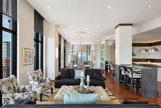 201 11th St Unit 2600, Minneapolis, MN 55403 - living area with wood finished floors, floor to ceiling windows, and recessed lighting
