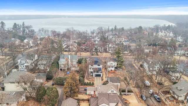 birds eye view of property with a residential view