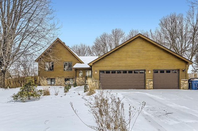 view of front of property featuring a garage