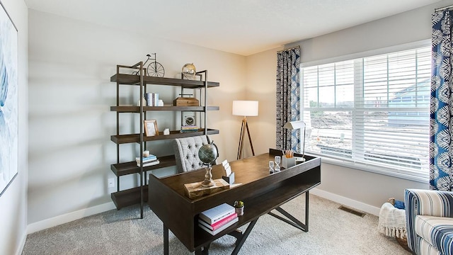 view of carpeted home office