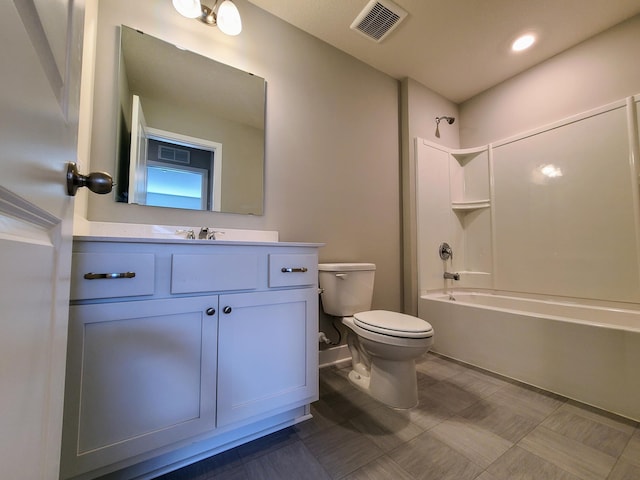 full bathroom featuring shower / washtub combination, toilet, and vanity