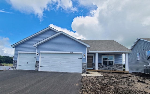 view of front of property featuring a garage