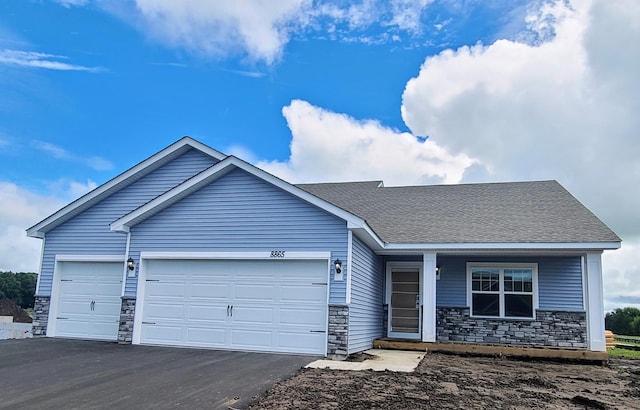 view of front of home with a garage