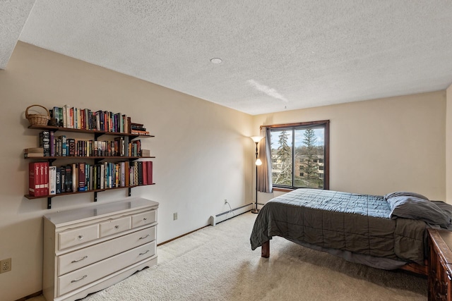 bedroom featuring a baseboard radiator, light colored carpet, and a textured ceiling