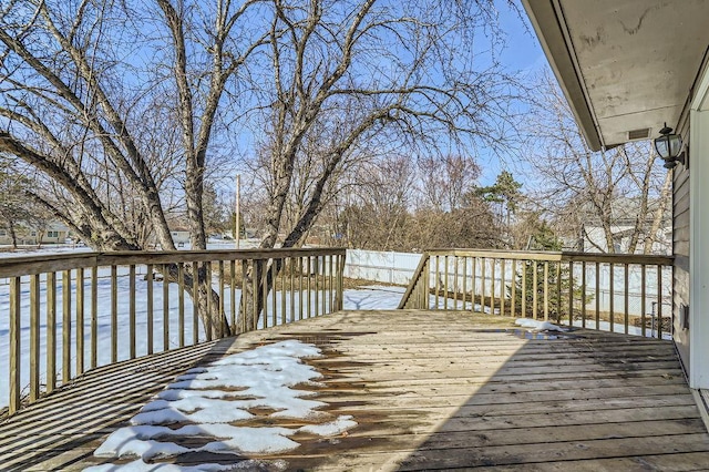 view of snow covered deck