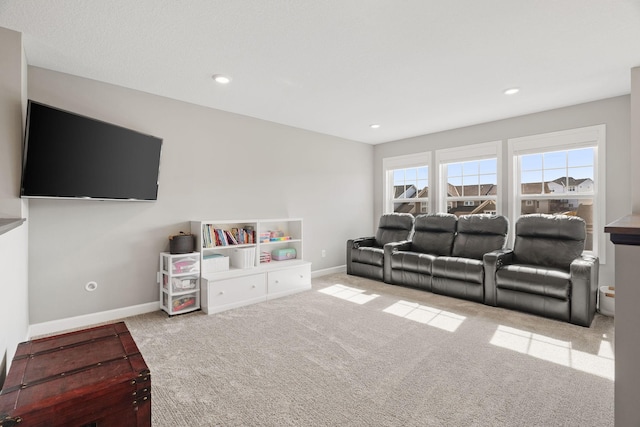 living area featuring recessed lighting, baseboards, and carpet floors