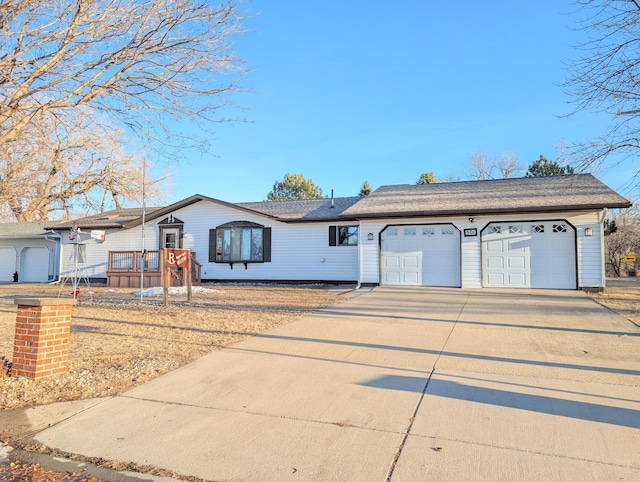 ranch-style home featuring a garage