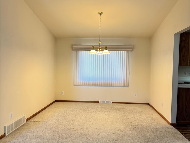 501 Lac Qui Parle Ave N, Canby, MN 56220 - empty room with carpet, a chandelier, and baseboards