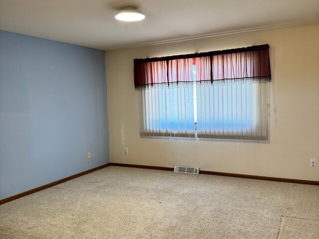 501 Lac Qui Parle Ave N, Canby, MN 56220 - empty room featuring carpet floors and baseboards