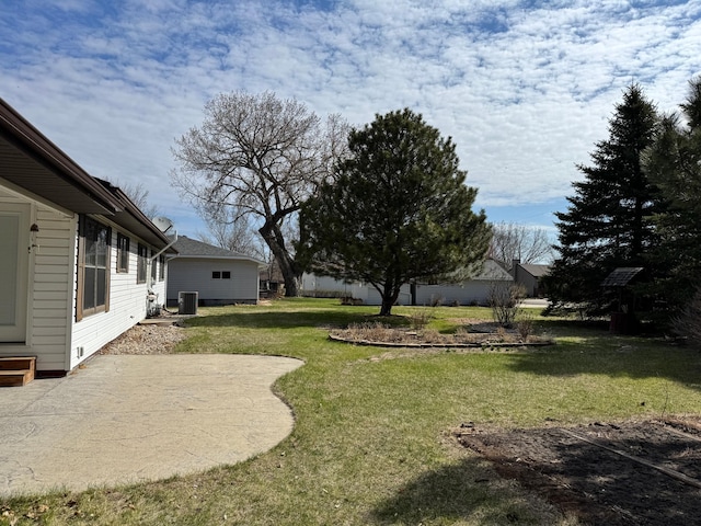501 Lac Qui Parle Ave N, Canby, MN 56220 - view of green lawn with a patio and central AC unit