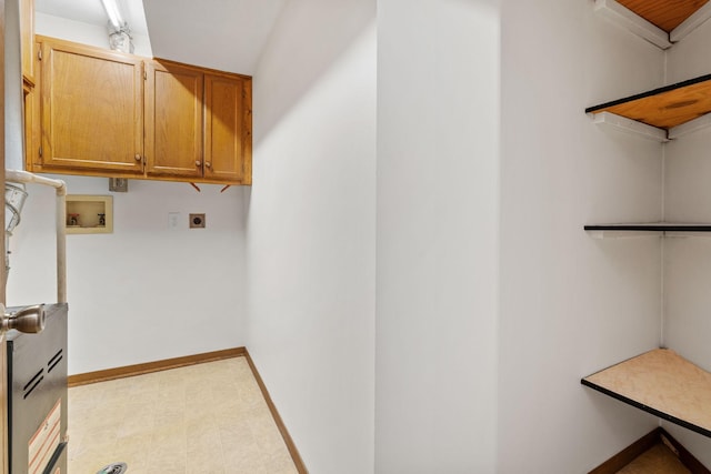 10 94th Cir NW Unit 201, Coon Rapids, MN 55448 - laundry room featuring hookup for an electric dryer, washer hookup, baseboards, cabinet space, and tile patterned floors