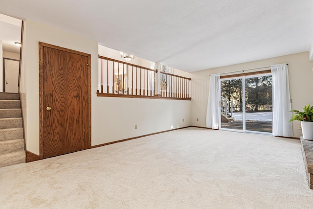 unfurnished room with carpet flooring