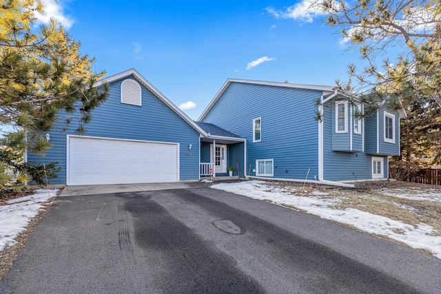 view of front of property featuring a garage