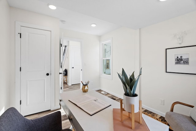 office area with light hardwood / wood-style floors