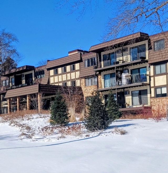 view of snow covered property