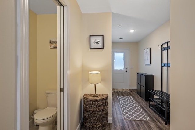 interior space with dark hardwood / wood-style flooring