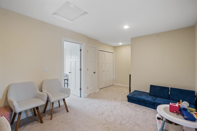 sitting room with light carpet