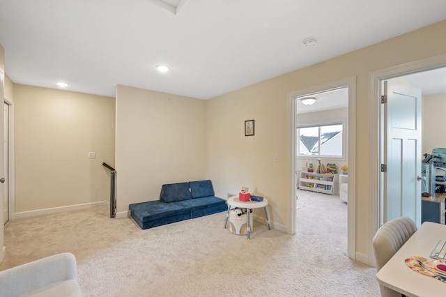 sitting room with light carpet