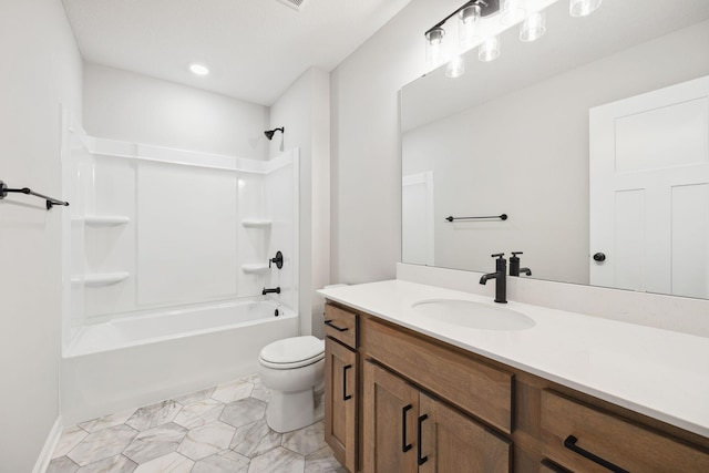 bathroom with vanity, toilet, and tub / shower combination
