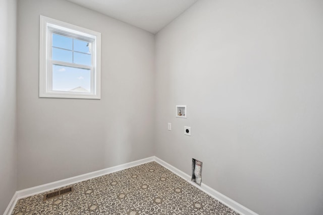 washroom featuring laundry area, hookup for a washing machine, baseboards, hookup for an electric dryer, and visible vents
