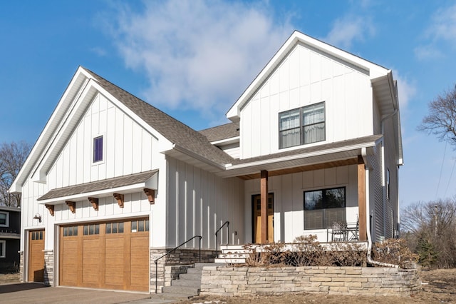 modern farmhouse style home featuring a garage and covered porch