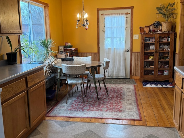 dining area featuring a chandelier and light hardwood / wood-style flooring