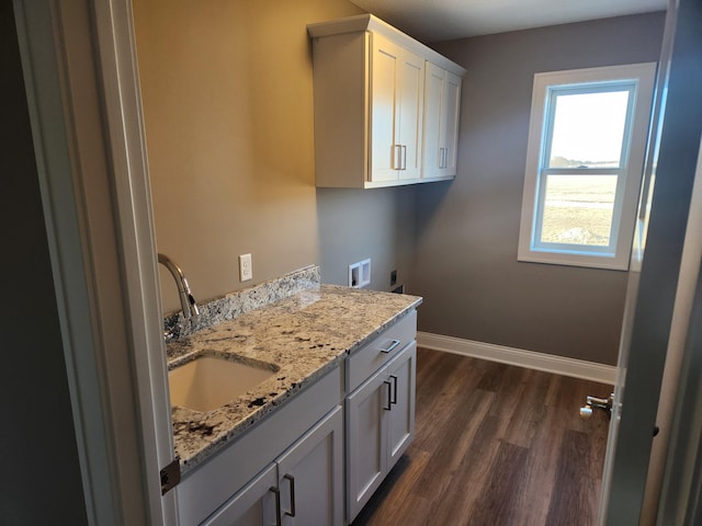 bathroom with vanity and wood-type flooring