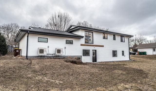 rear view of house with ac unit