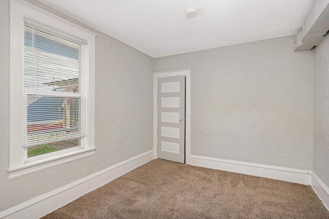 view of carpeted spare room