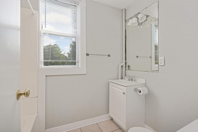 bathroom featuring vanity, tile patterned floors, and bathing tub / shower combination